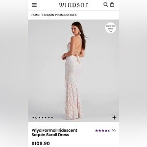 Brand: Windsor size small. Worn once to a ball. Has tulle going down the split